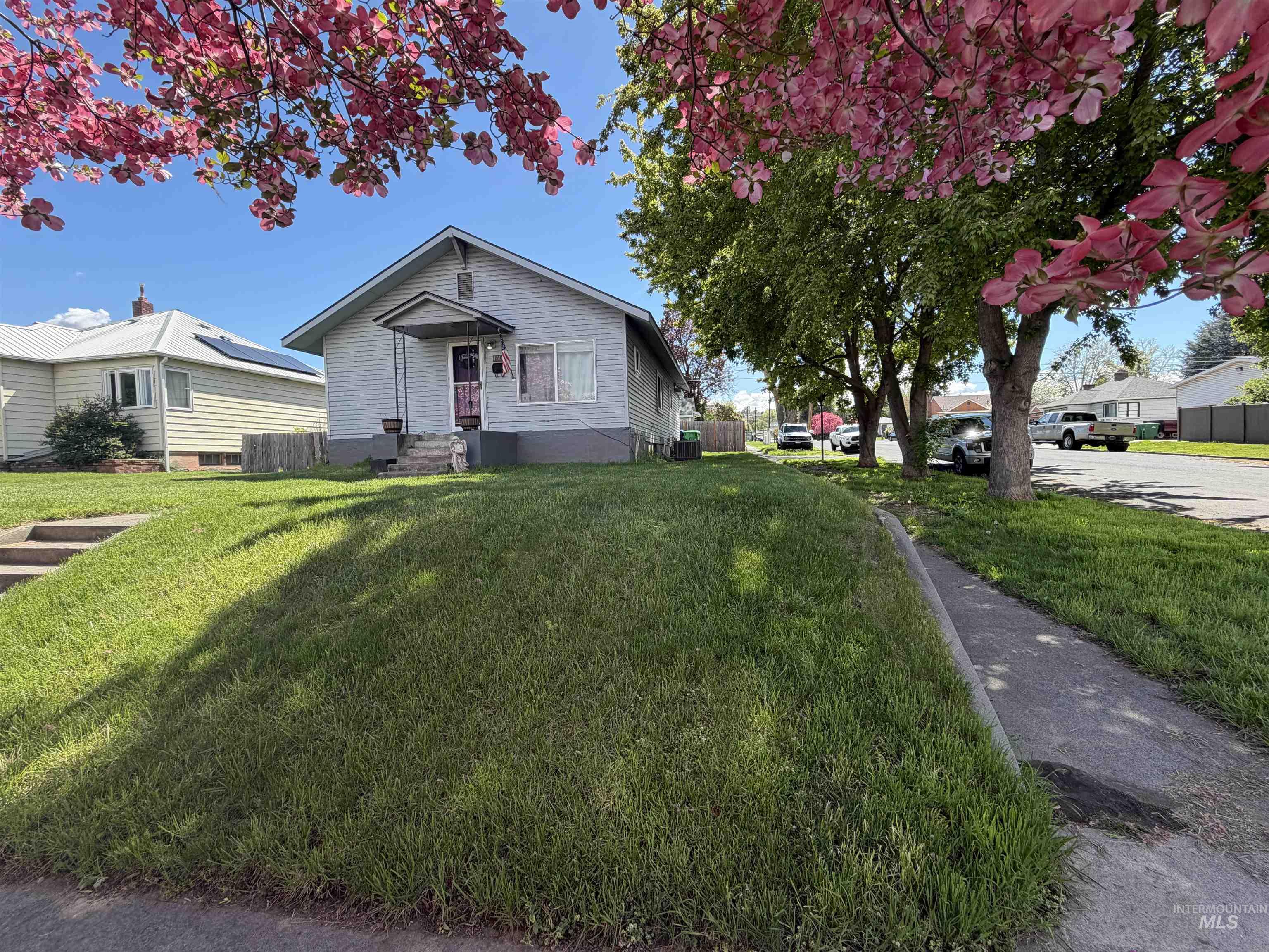 1602 14th Avenue Lewiston, ID 83501 - Photo 2 of 32 Single-story residence featuring light gray siding and a covered front entry
