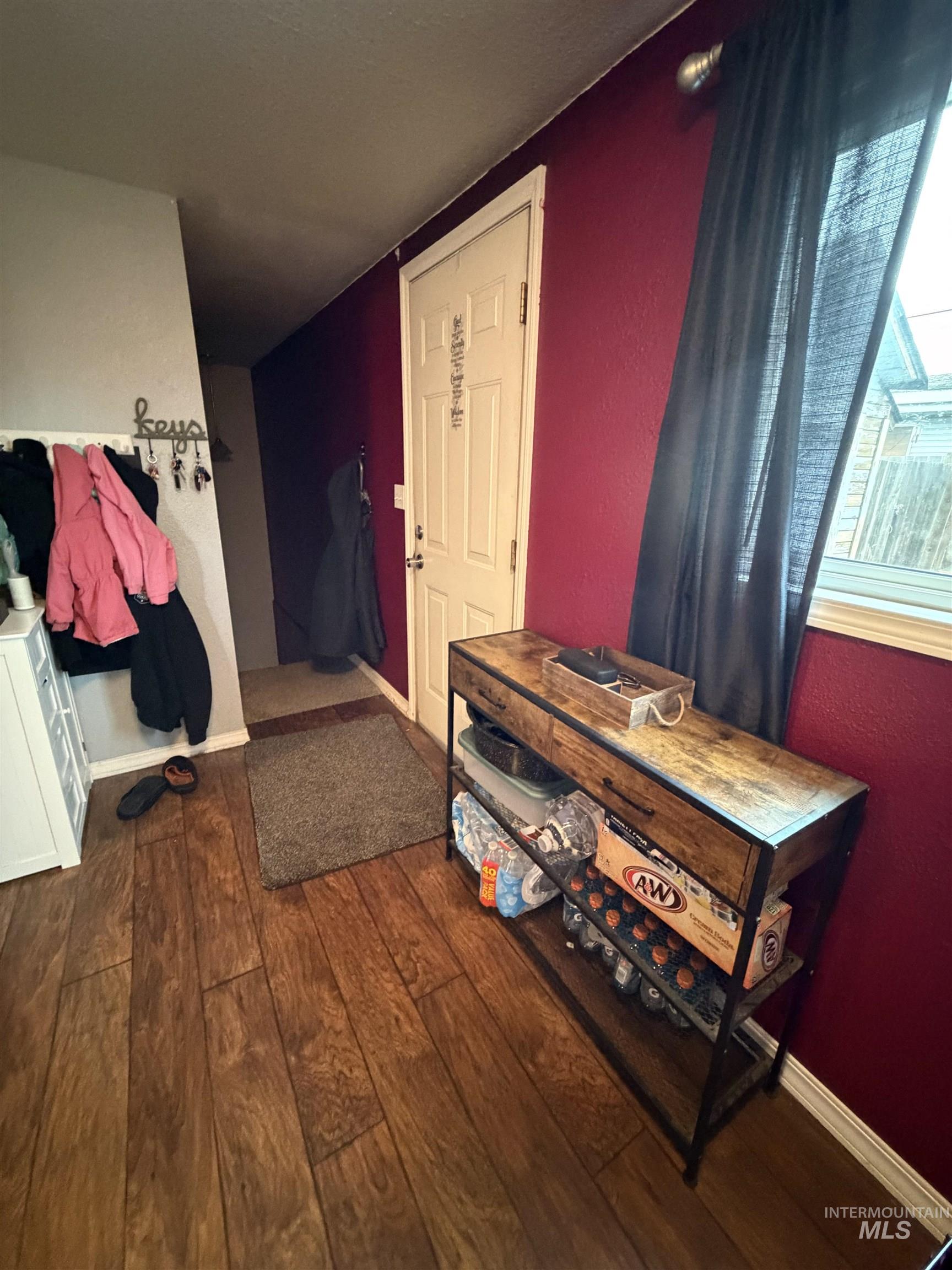 1602 14th Avenue Lewiston, ID 83501 - Photo 22 of 32 Miscellaneous room featuring a textured wall and dark wood-style floors