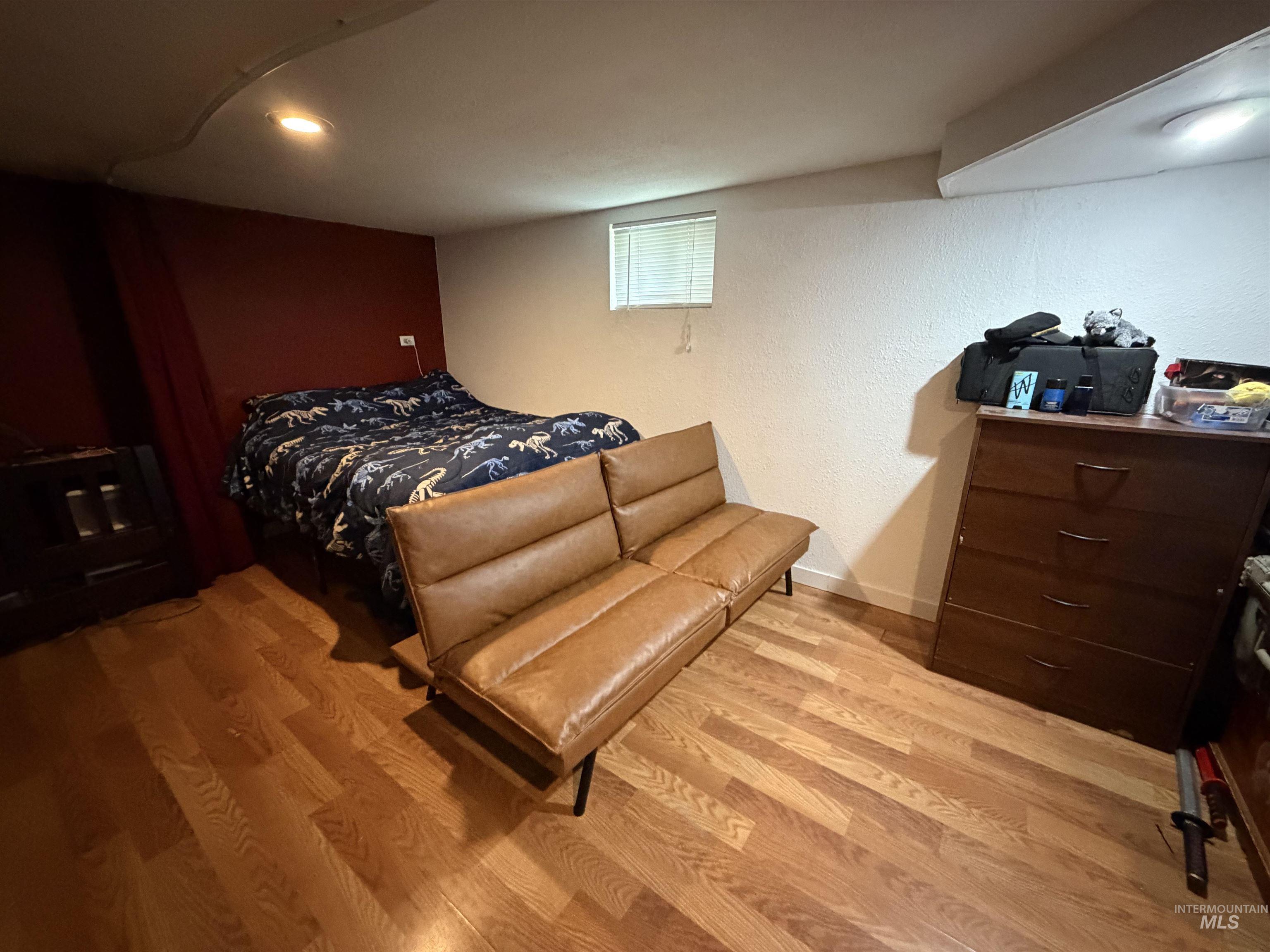 1602 14th Avenue Lewiston, ID 83501 - Photo 23 of 32 Bedroom with a textured wall and light wood finished floors