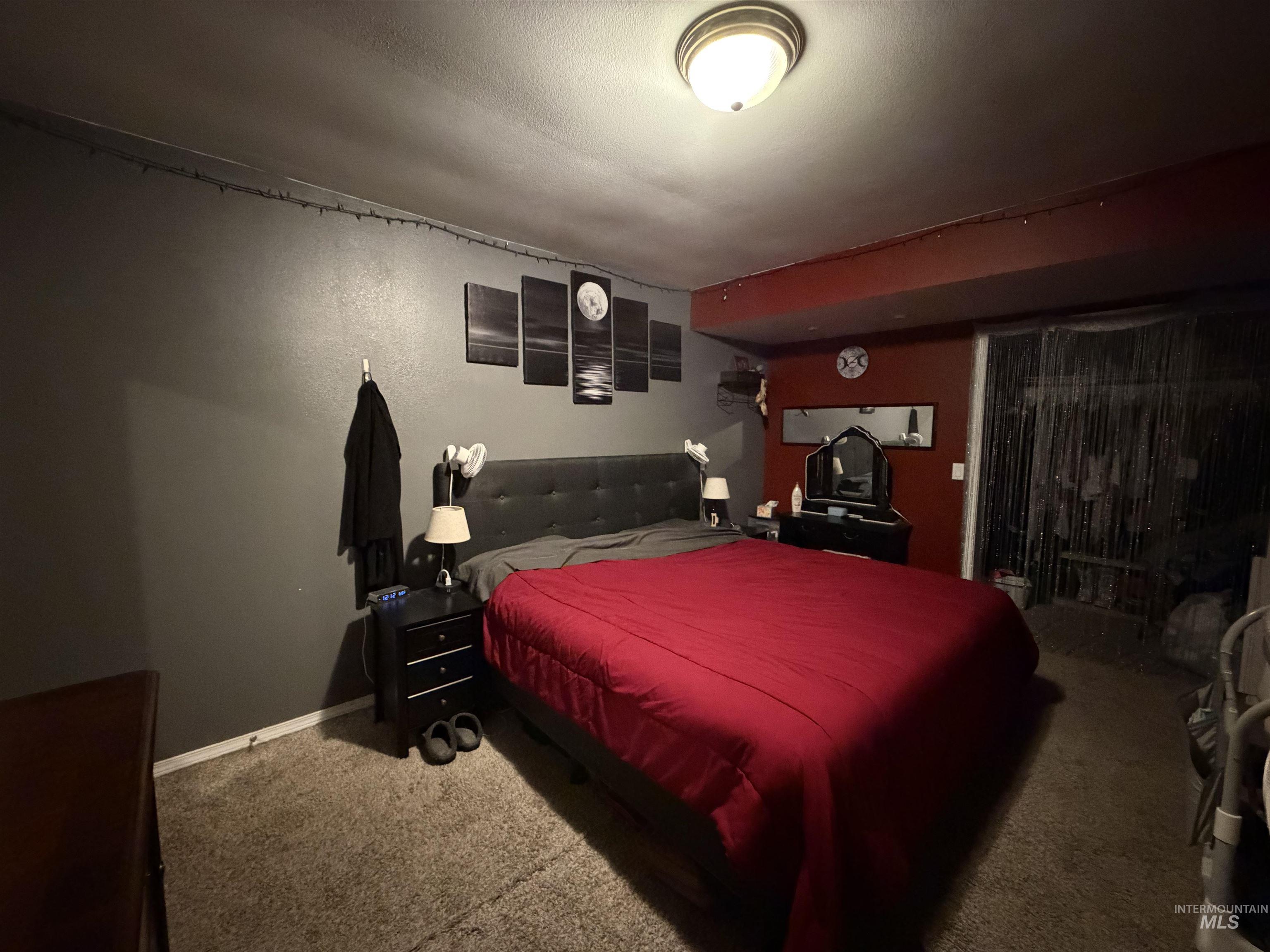 1602 14th Avenue Lewiston, ID 83501 - Photo 26 of 32 Carpeted bedroom featuring baseboards