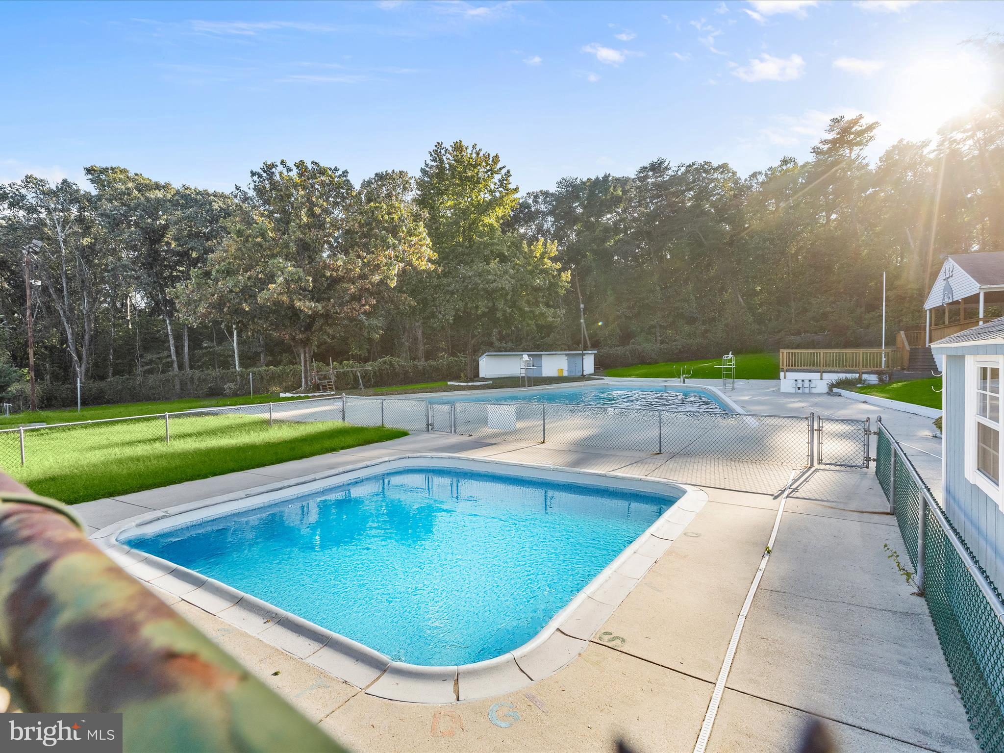 4 Ridgely Road Glen Burnie, MD 21061 - Photo 38 of 47 a view of a swimming pool with a yard and a fountain