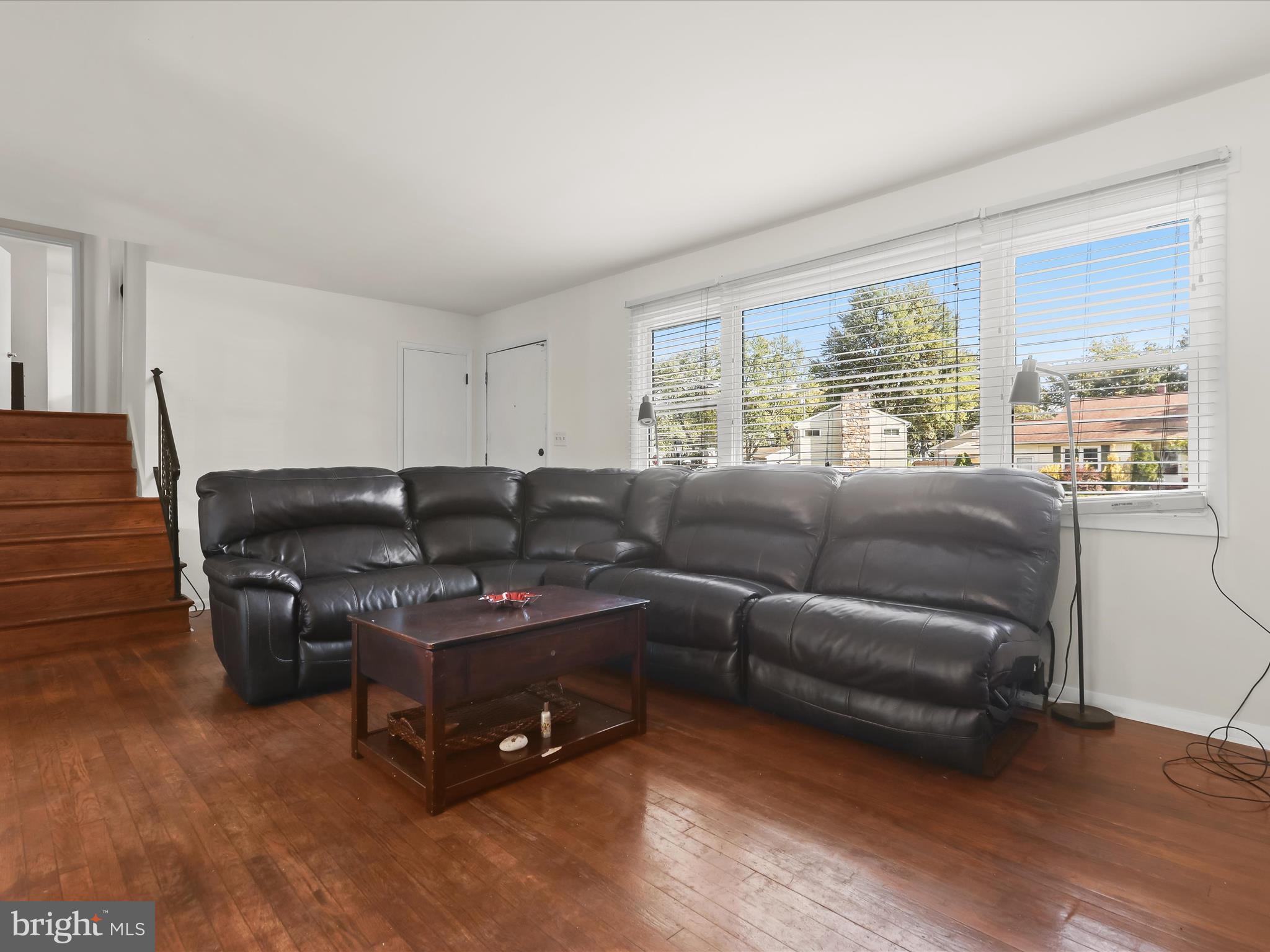 4 Ridgely Road Glen Burnie, MD 21061 - Photo 6 of 47 a living room with furniture and a large window