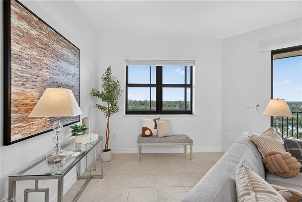 14380 Riva Del Lago Drive, Unit 802 Fort Myers, FL 33907 - Photo 17 of 49 a living room with furniture and a window