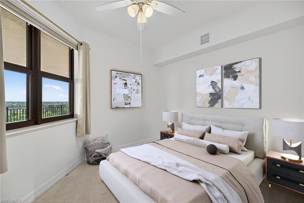 14380 Riva Del Lago Drive, Unit 802 Fort Myers, FL 33907 - Photo 21 of 49 a bedroom with a bed and a painting on the wall