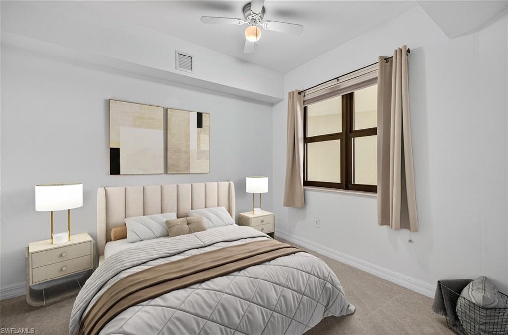 14380 Riva Del Lago Drive, Unit 802 Fort Myers, FL 33907 - Photo 22 of 49 a bedroom with a large bed and a window