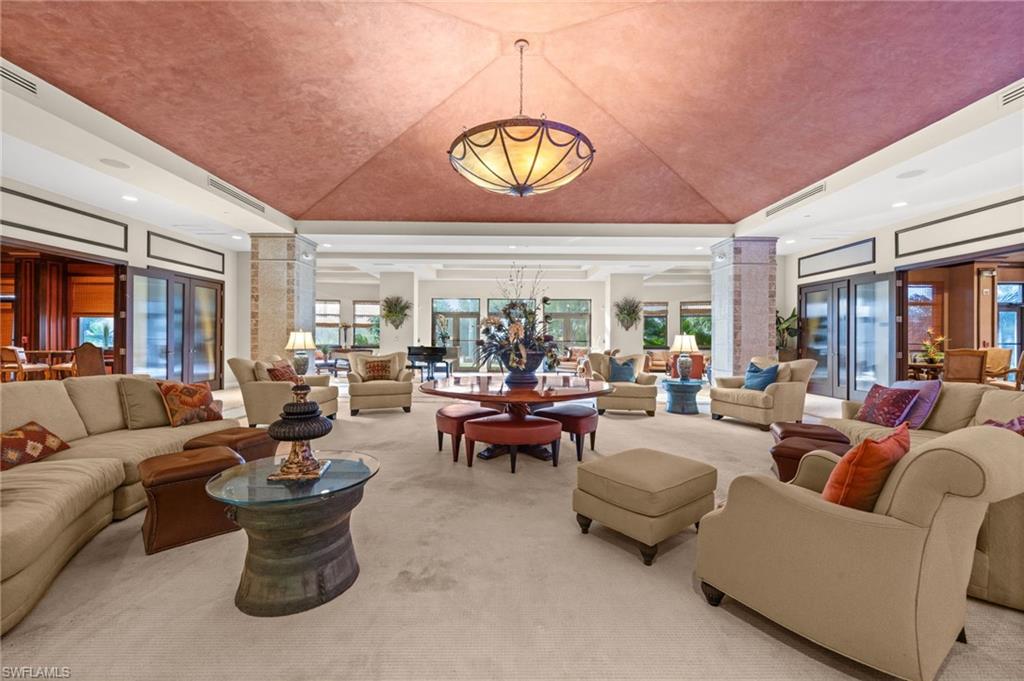 14380 Riva Del Lago Drive, Unit 802 Fort Myers, FL 33907 - Photo 30 of 49 a living room with furniture and a large window