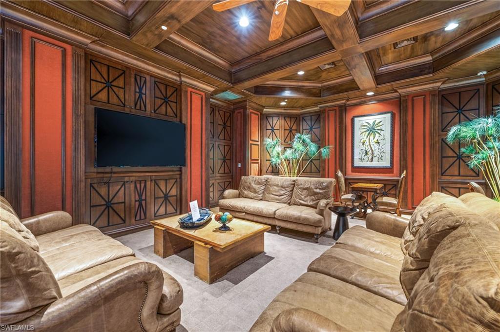 14380 Riva Del Lago Drive, Unit 802 Fort Myers, FL 33907 - Photo 32 of 49 a living room with furniture a window and a flat screen tv