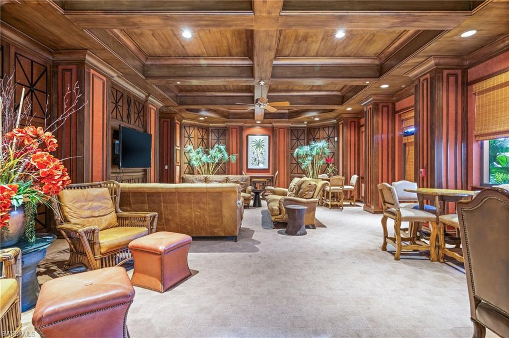 14380 Riva Del Lago Drive, Unit 802 Fort Myers, FL 33907 - Photo 35 of 49 a living room with furniture and a chandelier