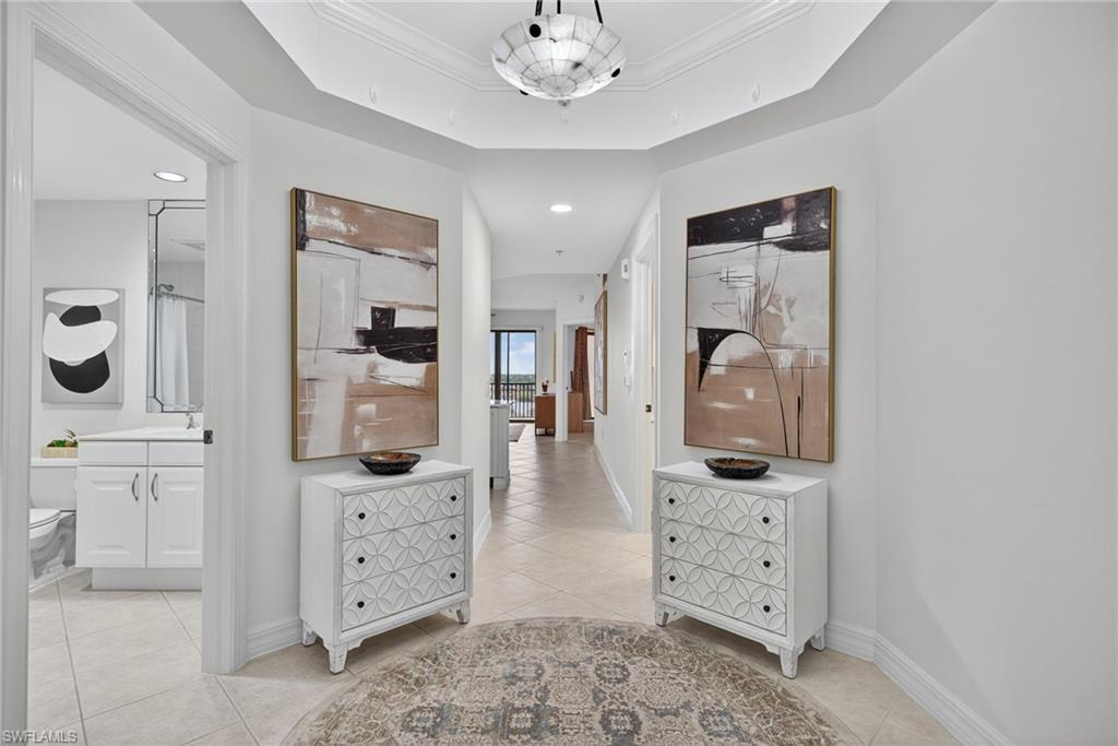 14380 Riva Del Lago Drive, Unit 802 Fort Myers, FL 33907 - Photo 8 of 49 walk in closet with white cabinets