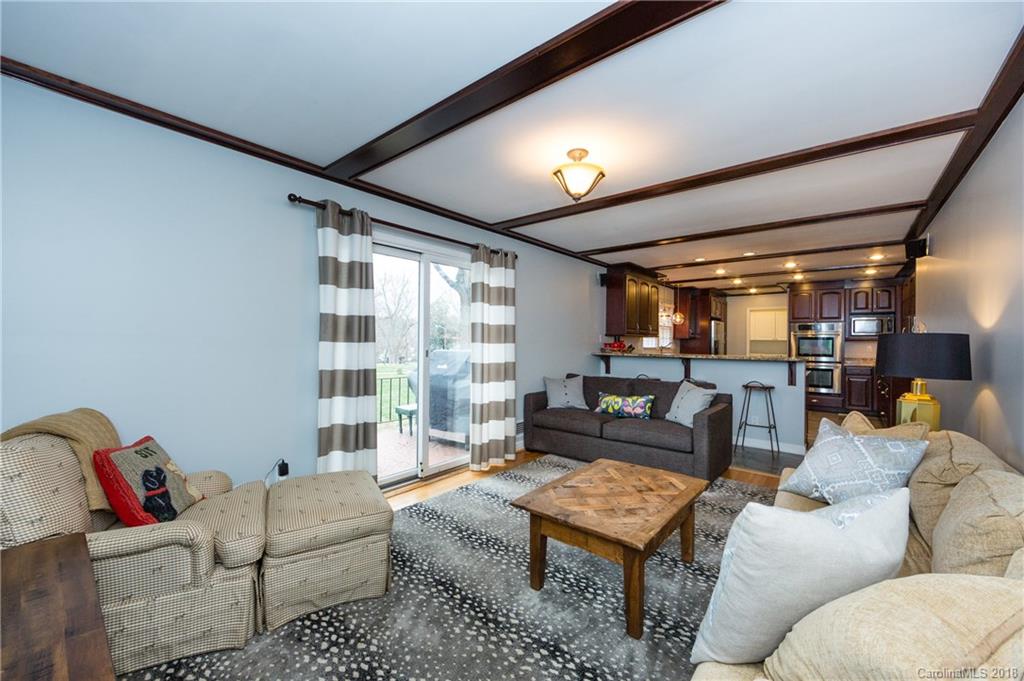 4615 Walker Road Charlotte, NC 28211 - Photo 14 of 28 a living room with furniture and a large window