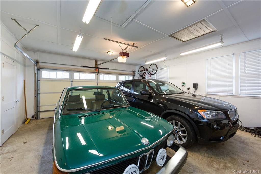 4615 Walker Road Charlotte, NC 28211 - Photo 20 of 28 a car parked in a garage