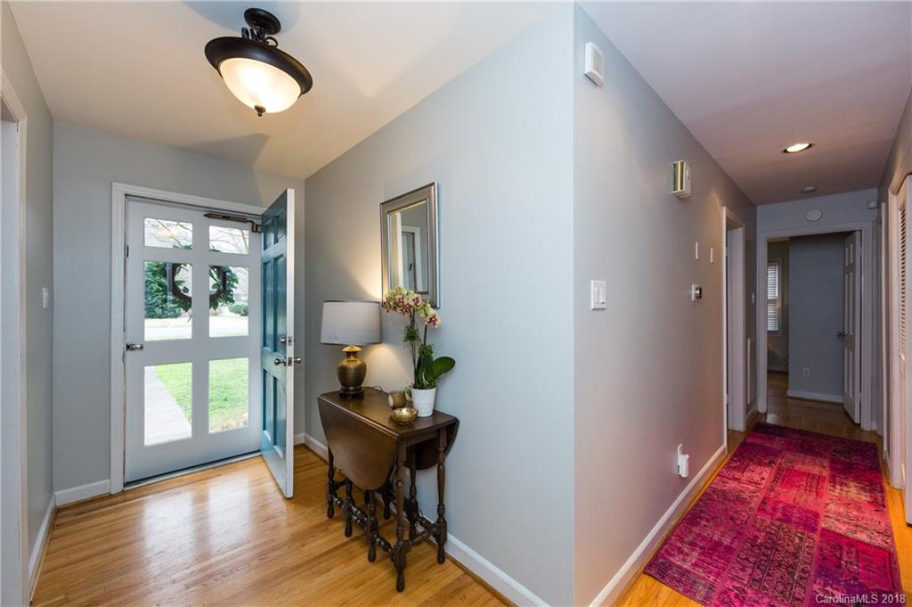 4615 Walker Road Charlotte, NC 28211 - Photo 3 of 28 a view of a livingroom with furniture window and wooden floor