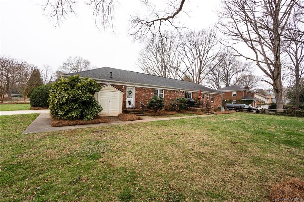 4615 Walker Road Charlotte, NC 28211 - Photo 24 of 28 a view of a house with a yard