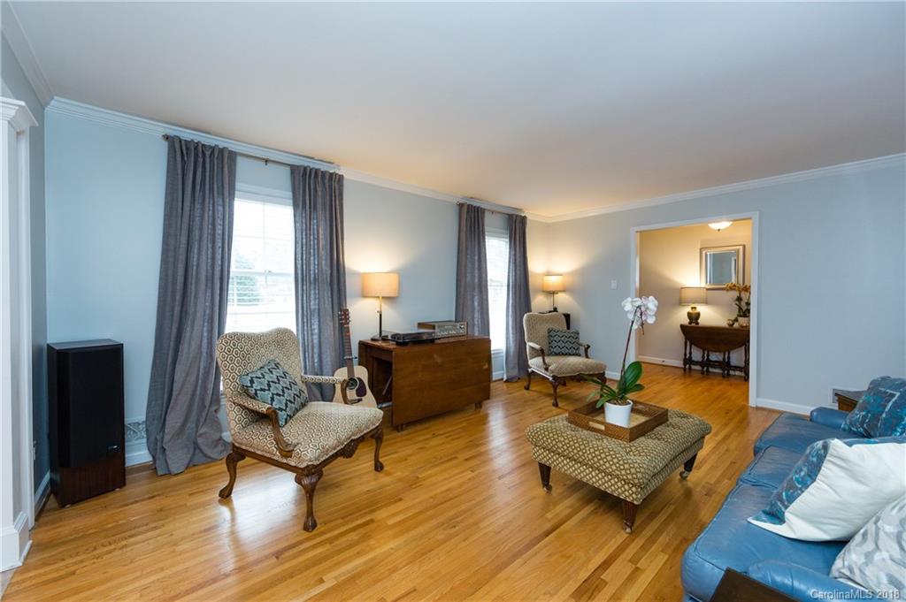 4615 Walker Road Charlotte, NC 28211 - Photo 5 of 28 a living room with furniture and a fireplace