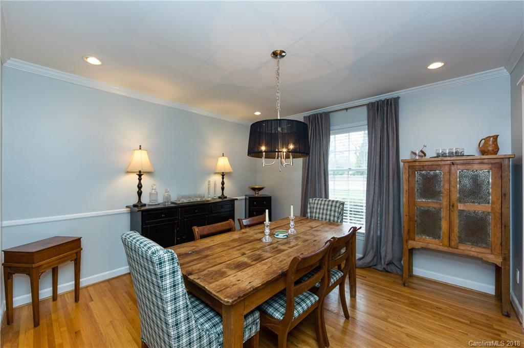 4615 Walker Road Charlotte, NC 28211 - Photo 7 of 28 a dining room with furniture and wooden floor