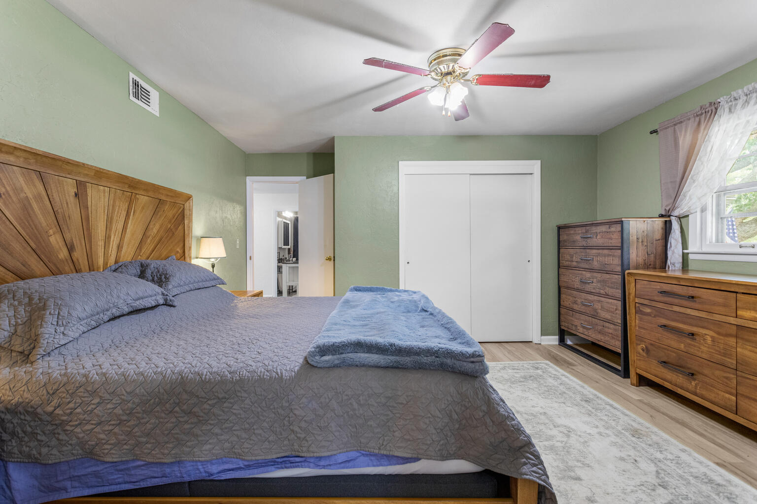 504 South West Union Street Monticello, IL 61856 - Photo 19 of 35 a living room with furniture and a dresser