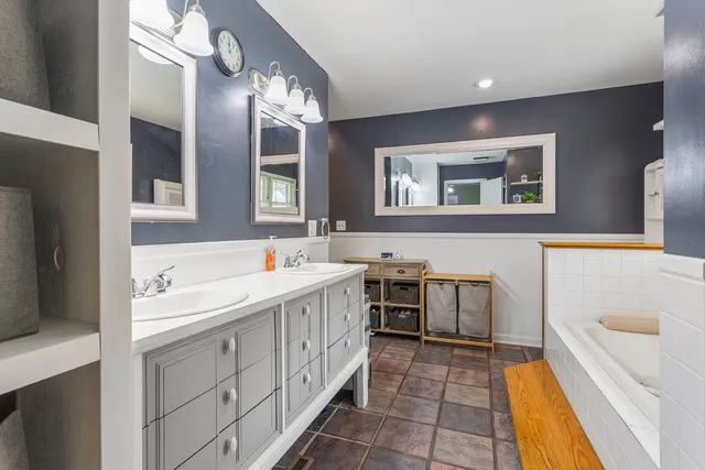 a kitchen with a sink and a stove top oven