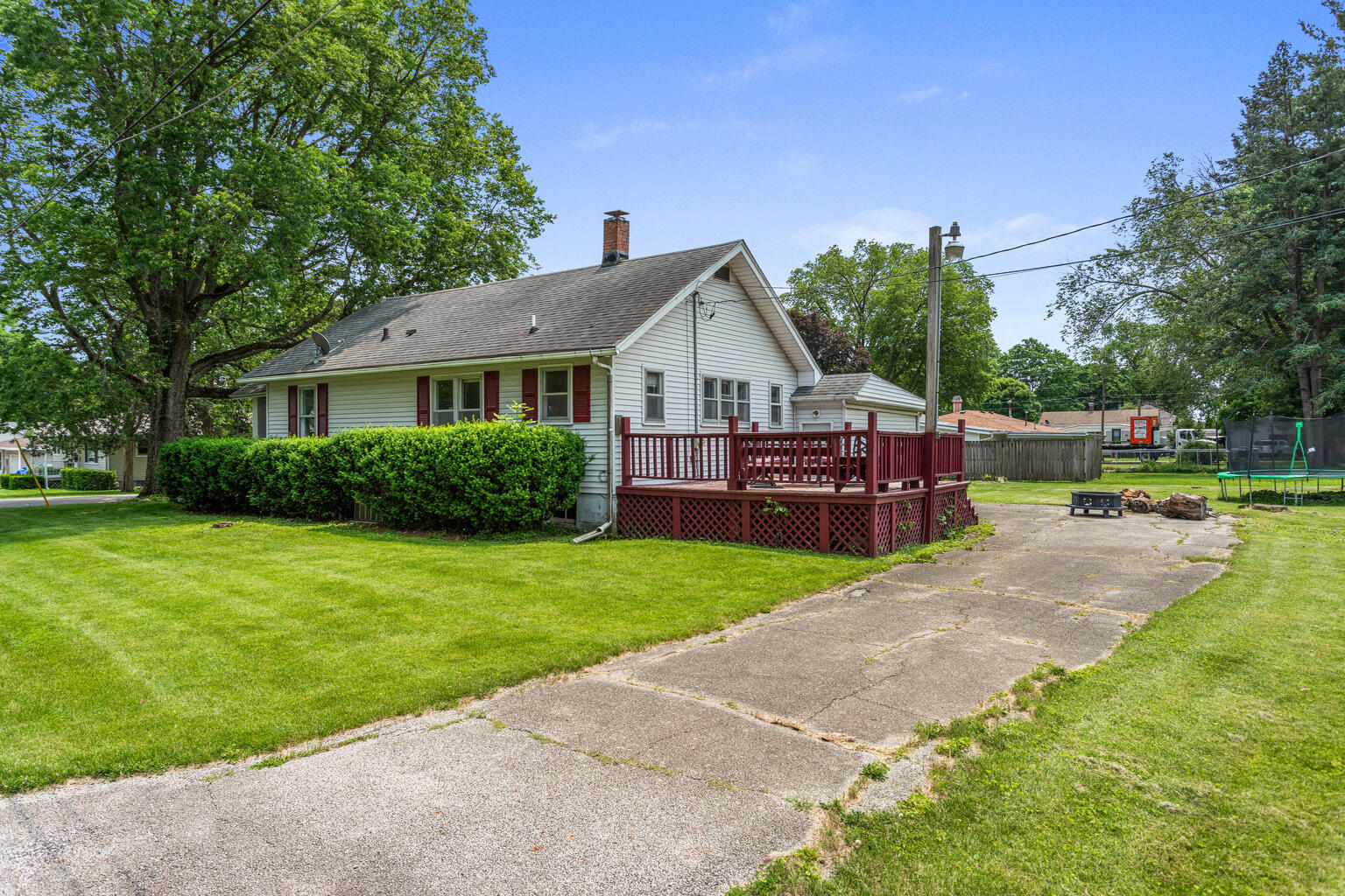 504 South West Union Street Monticello, IL 61856 - Photo 30 of 35 a view of a house with a backyard and a patio