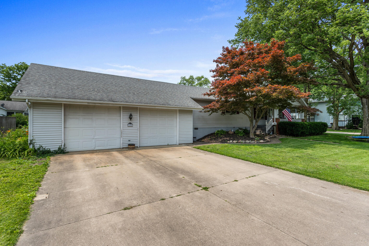 504 South West Union Street Monticello, IL 61856 - Photo 32 of 35 a house with yard in front of it