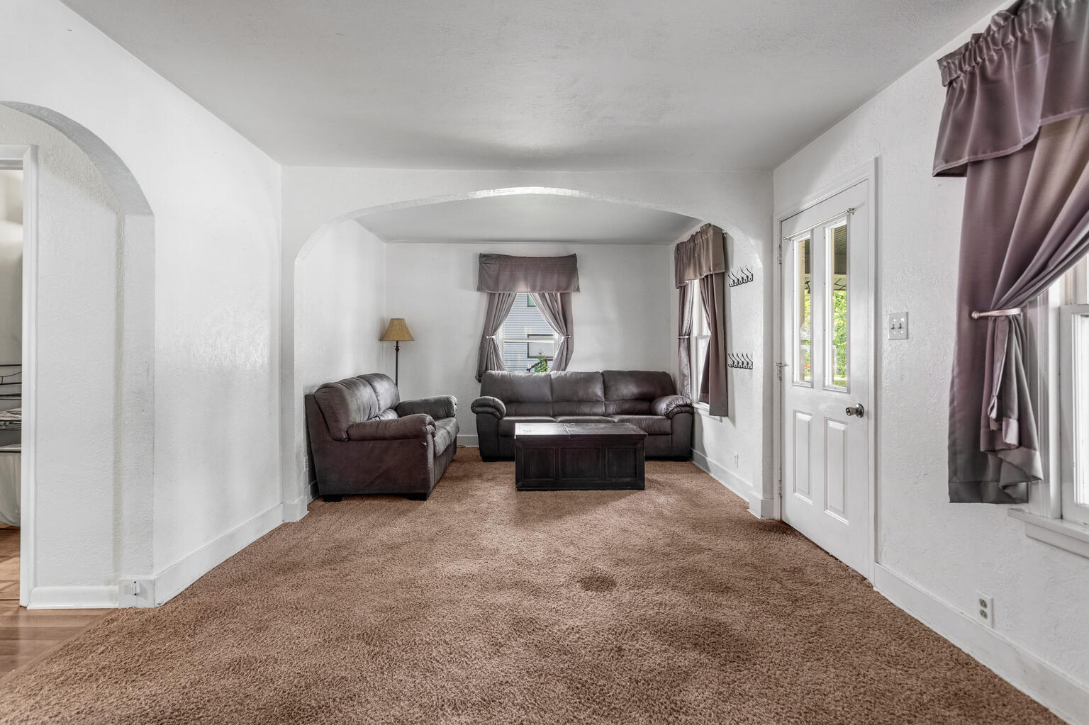 504 South West Union Street Monticello, IL 61856 - Photo 8 of 35 a living room with furniture and a piano