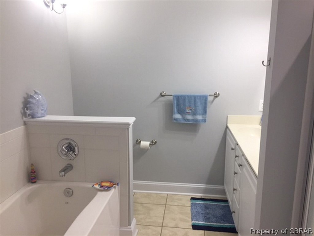 740 Marsh Pungo Road Locust Hill, VA 23092 - Photo 15 of 26 Master bath on first floor with soaker tub