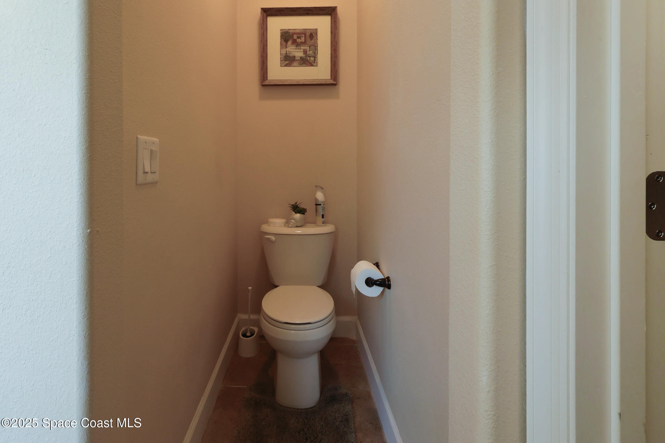 249 Franzing Street Palm Bay, FL 32908 - Photo 13 of 38 a bathroom with a toilet and a sink