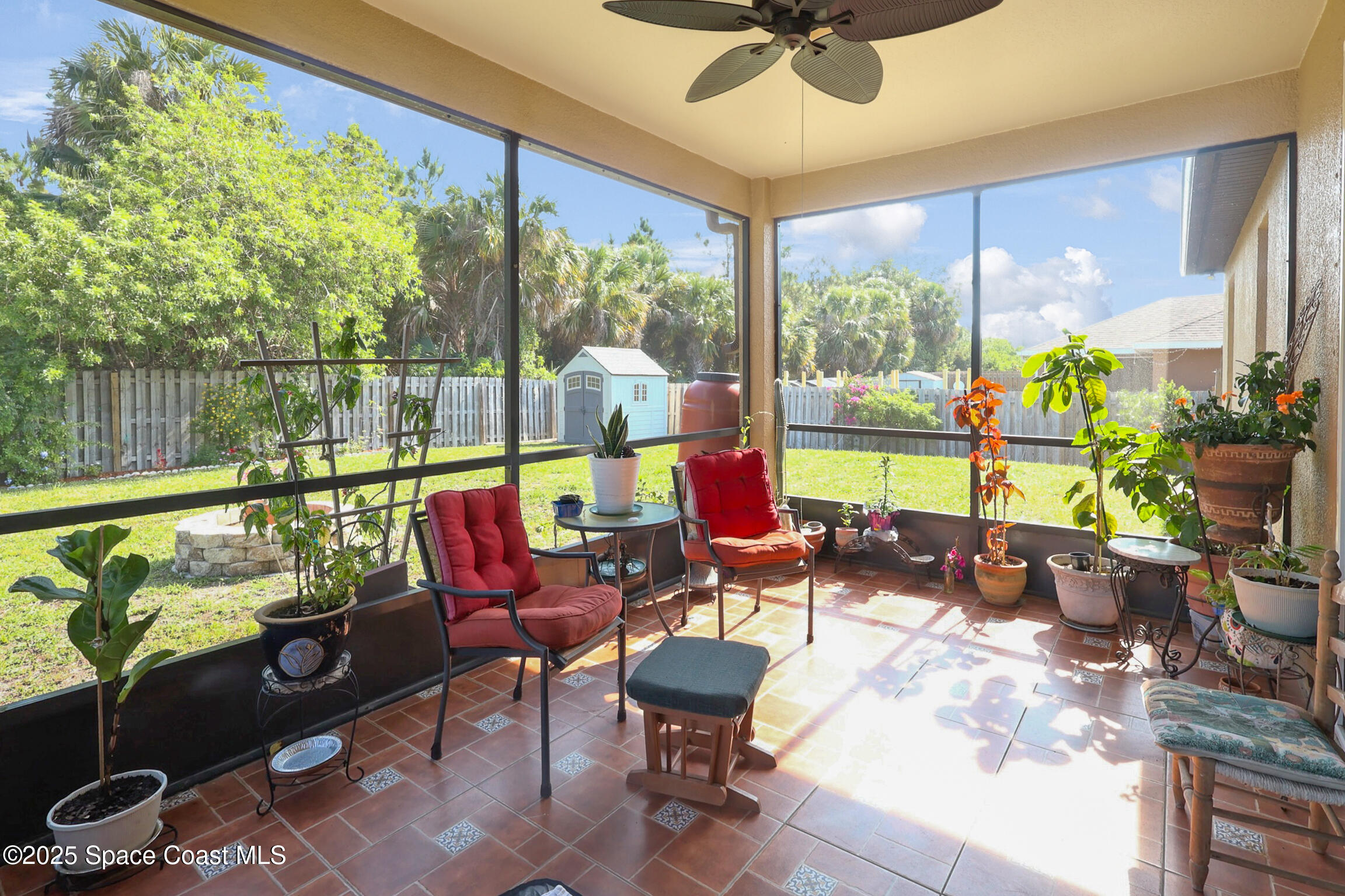 249 Franzing Street Palm Bay, FL 32908 - Photo 24 of 38 a room with furniture and a large window