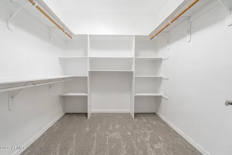 a view of an empty walk in closet
