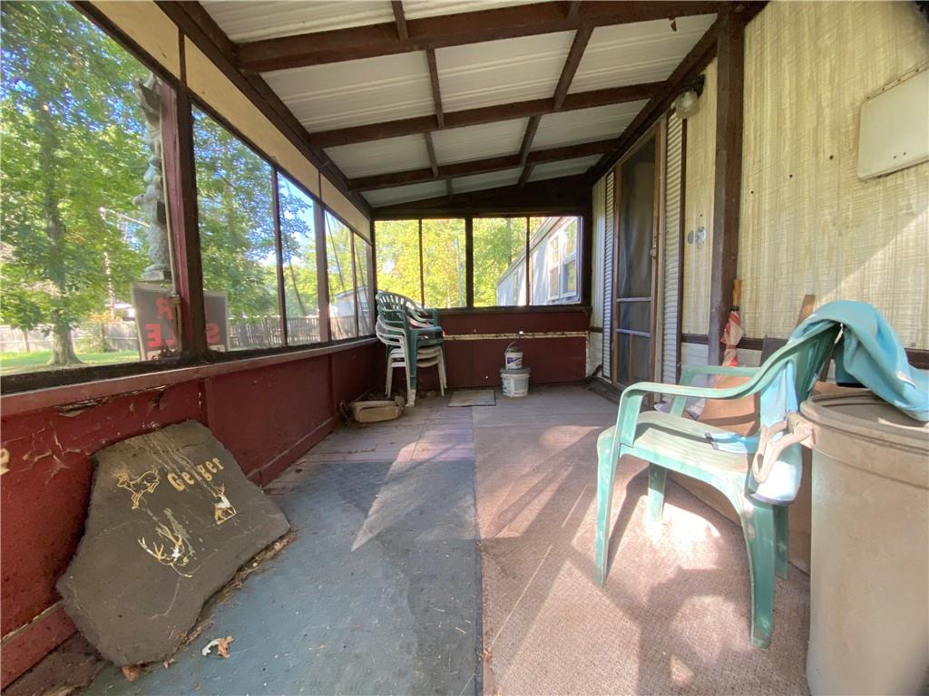 ENCLOSED FRONT PORCH