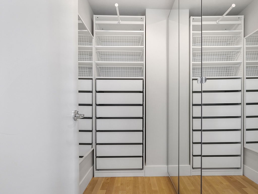 110 Stuart Street, Unit 23G Boston, MA 02116 - Photo 21 of 39 a view of walk in closet with empty racks