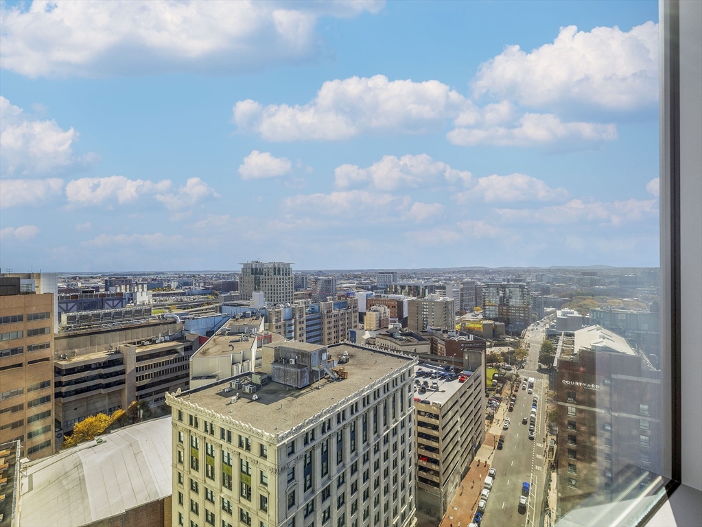 110 Stuart Street, Unit 23G Boston, MA 02116 - Photo 27 of 39 a view of a city with tall buildings