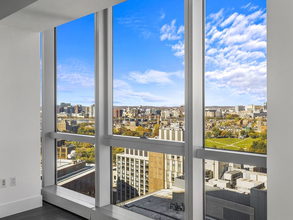 110 Stuart Street, Unit 23G Boston, MA 02116 - Photo 5 of 39 a view of a glass door and deck