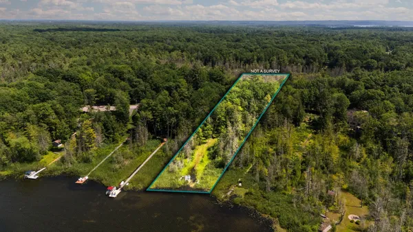$450,000 | 10000 Harmony Drive, Unit LOT: 29, Interlochen, MI 49643