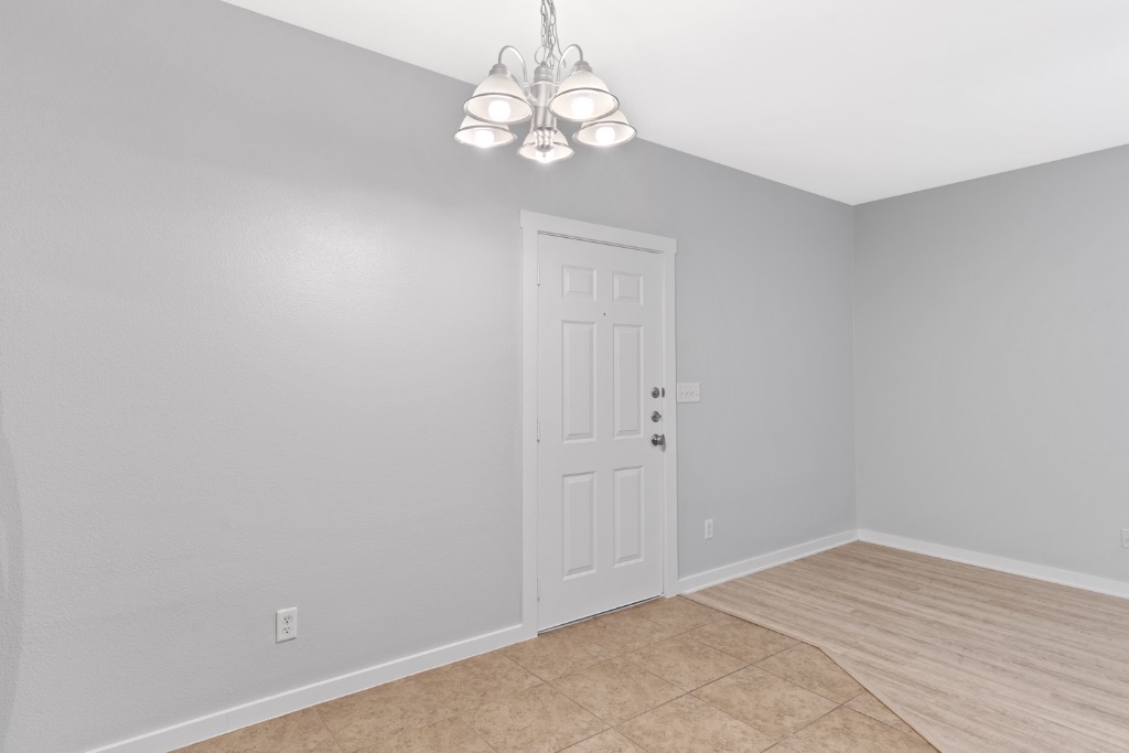 2106 Cullen Avenue, Unit 206 Austin, TX 78757 - Photo 6 of 15 a view of empty room with wooden floor