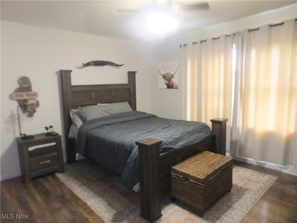 10677 Moss Road Lodi, OH 44254 - Photo 5 of 34 Bedroom featuring wood finished floors and ceiling fan