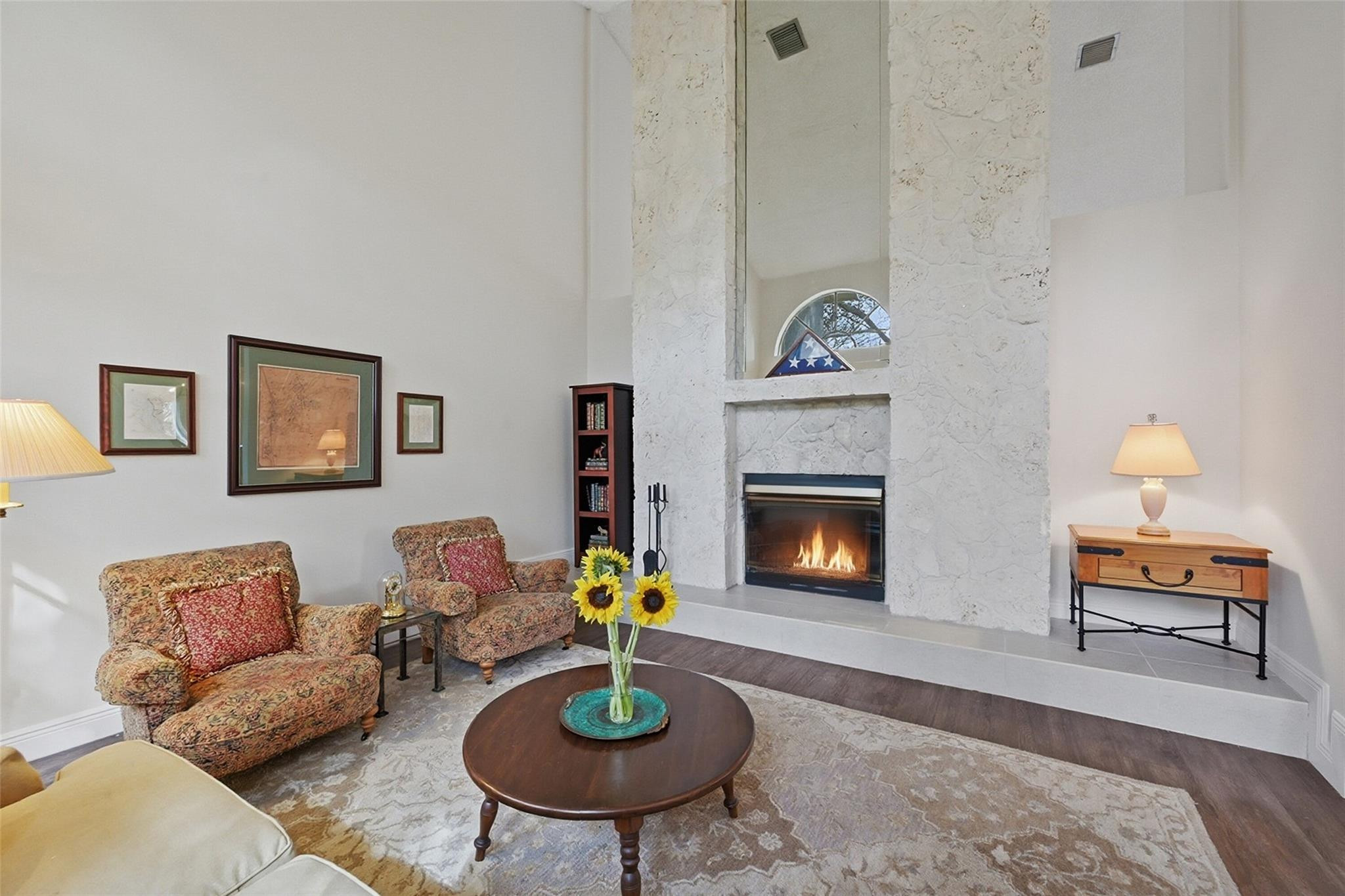 7720 West Upper Ridge Drive Parkland, FL 33067 - Photo 13 of 85 a living room with furniture and a fireplace