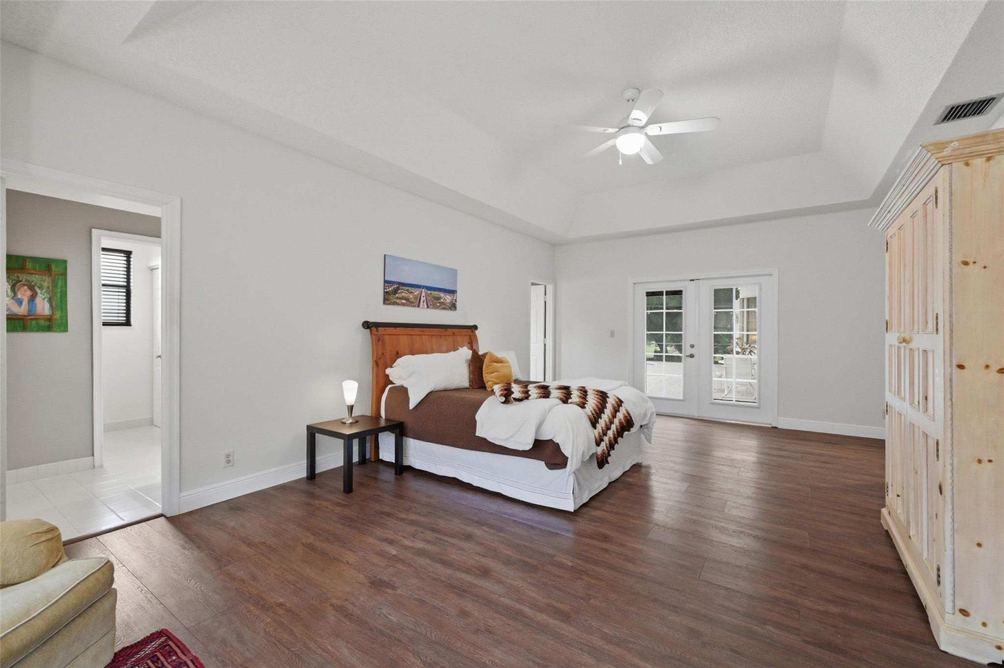 7720 West Upper Ridge Drive Parkland, FL 33067 - Photo 33 of 85 a living room with furniture and a wooden floor