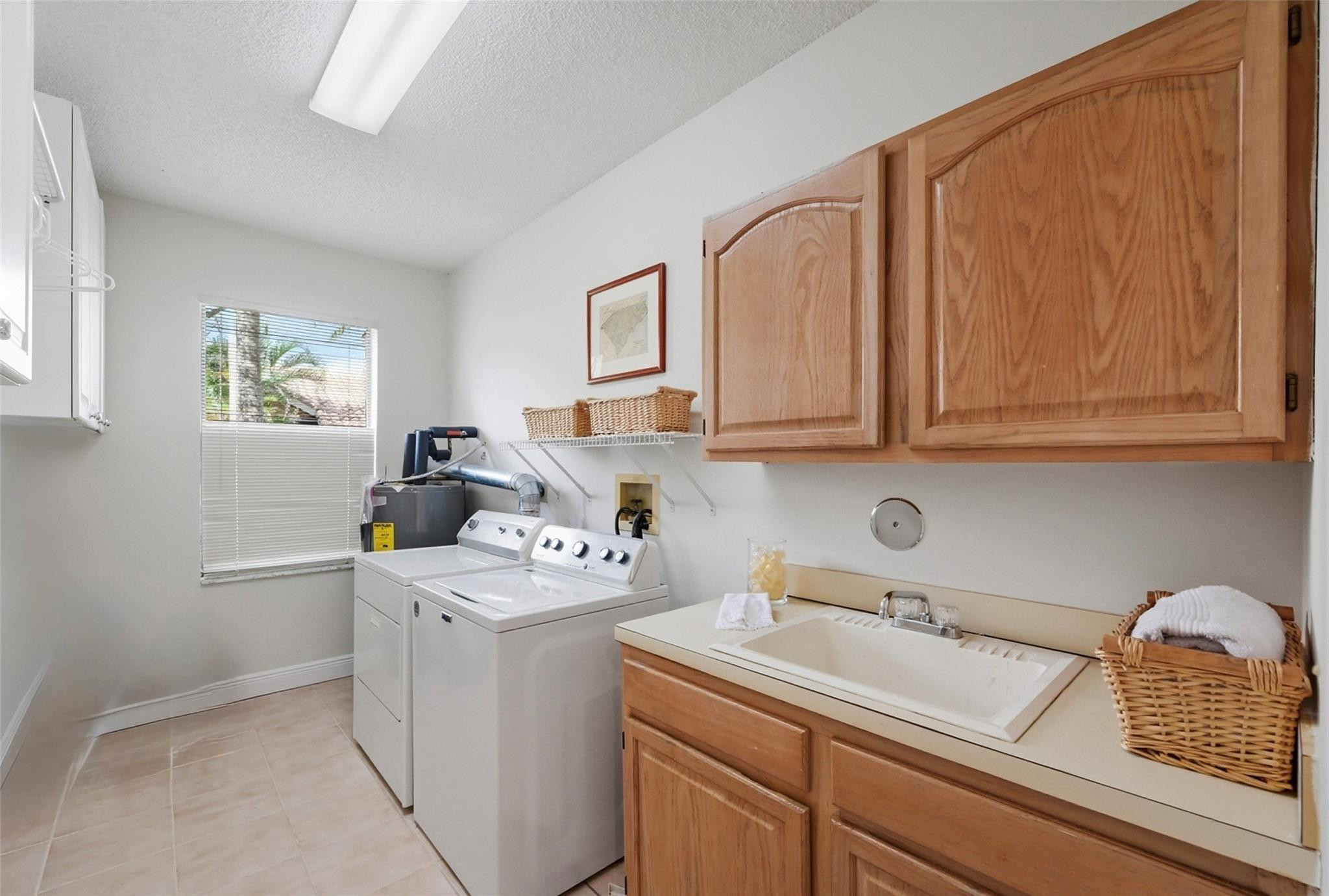 7720 West Upper Ridge Drive Parkland, FL 33067 - Photo 52 of 85 Laundry room with storage