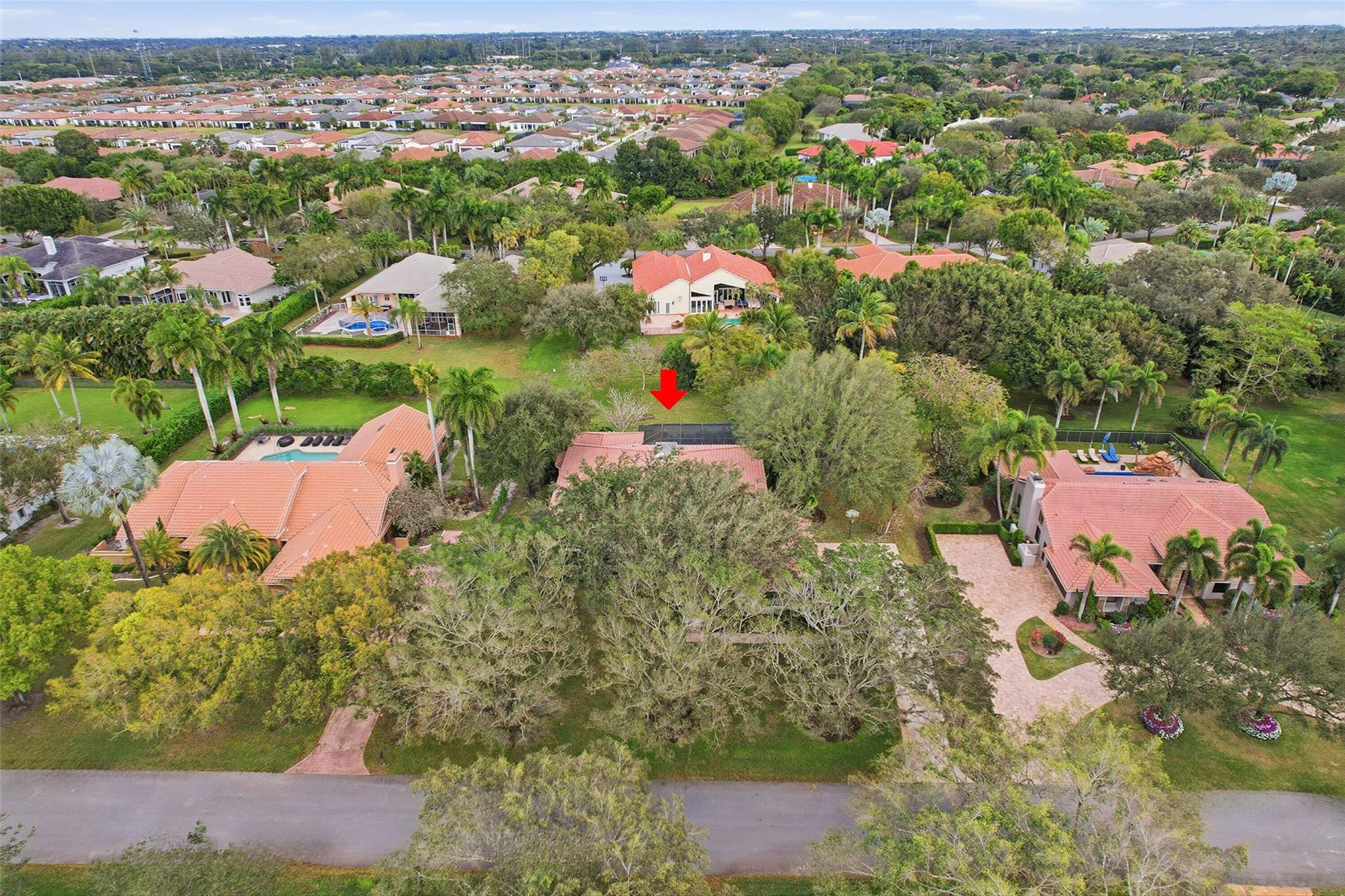 7720 West Upper Ridge Drive Parkland, FL 33067 - Photo 67 of 85 an aerial view of residential houses with outdoor space