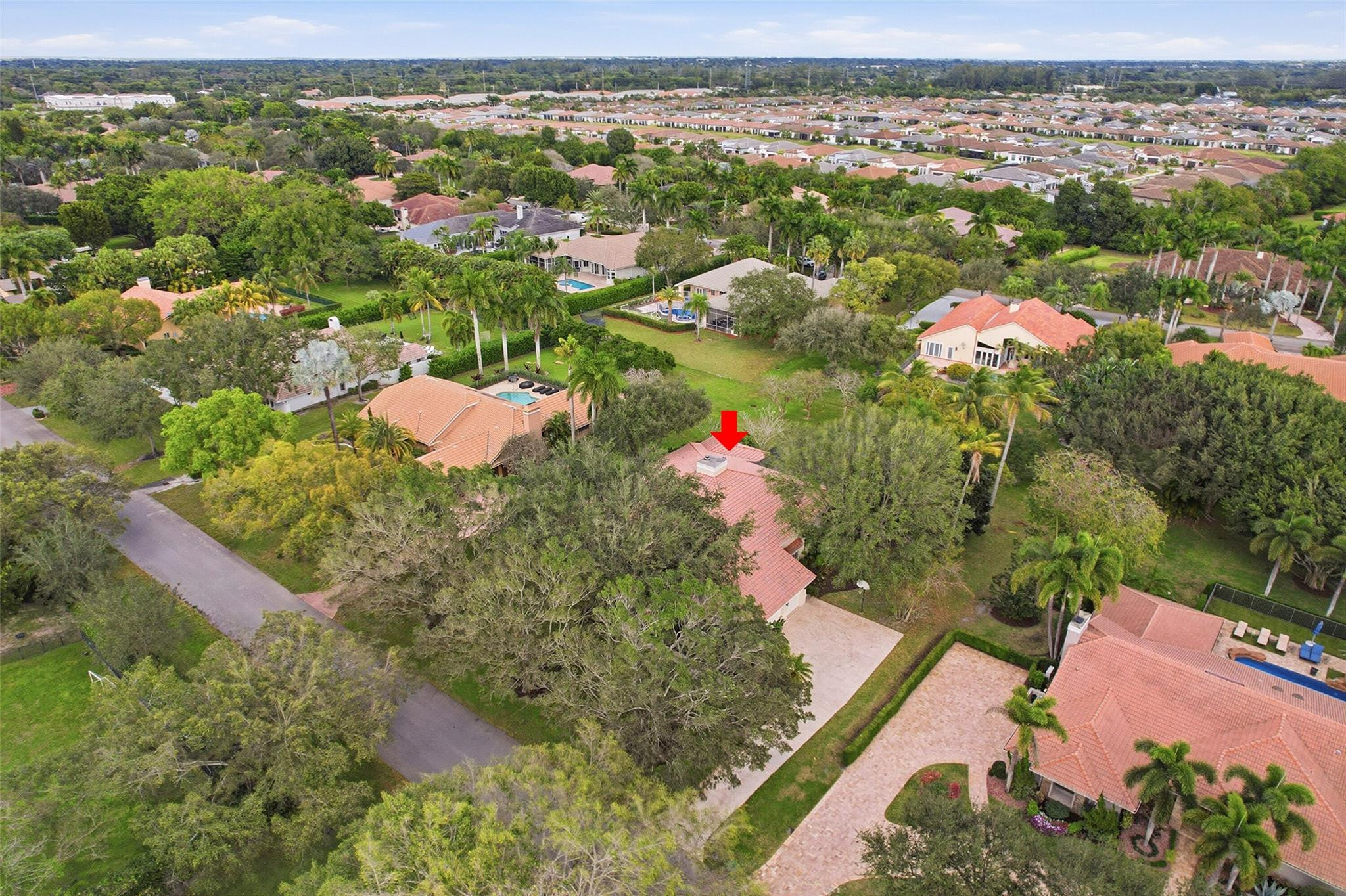 7720 West Upper Ridge Drive Parkland, FL 33067 - Photo 68 of 85 an aerial view of residential houses with outdoor space