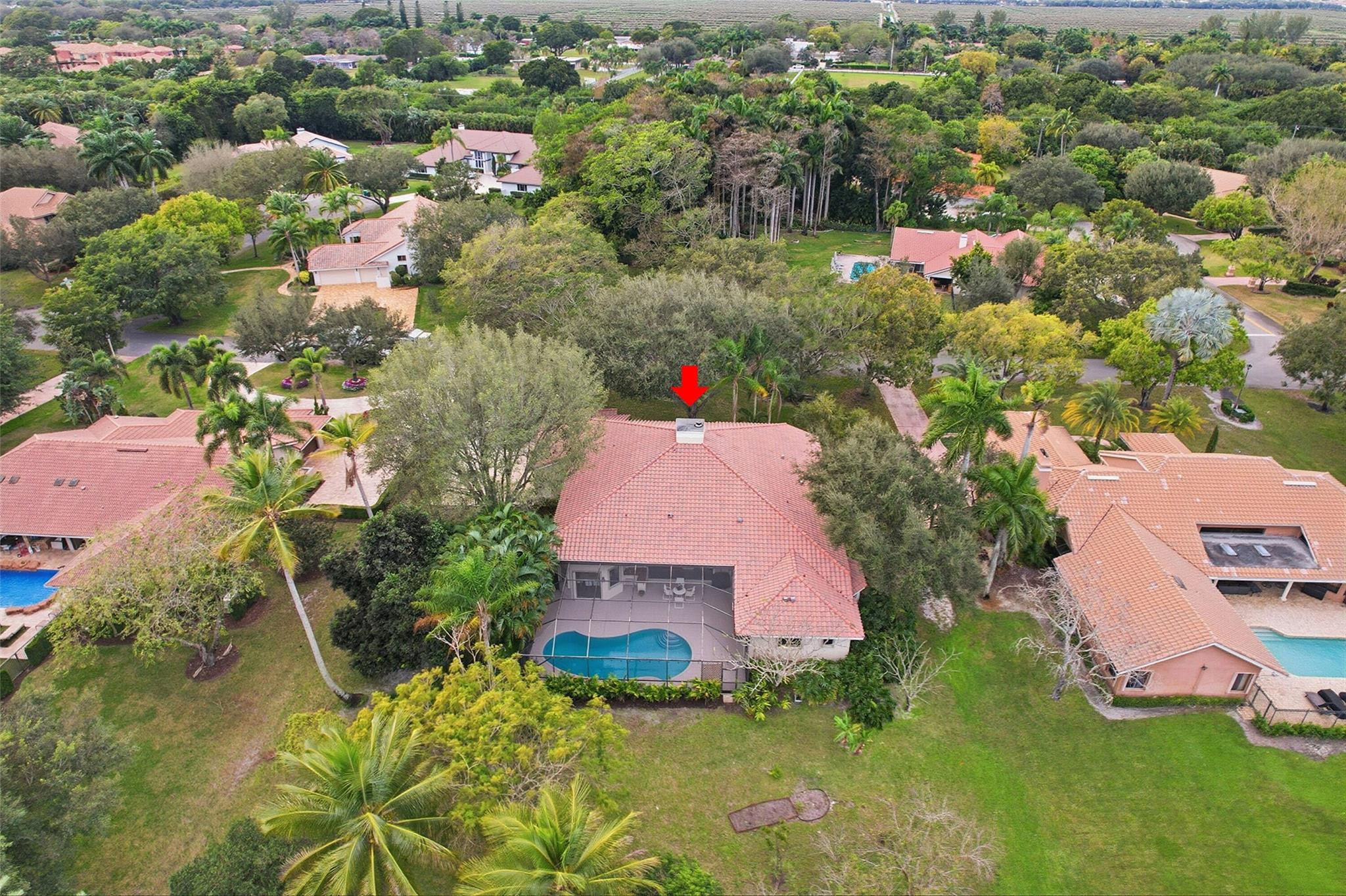 7720 West Upper Ridge Drive Parkland, FL 33067 - Photo 71 of 85 an aerial view of house with yard swimming pool and outdoor seating