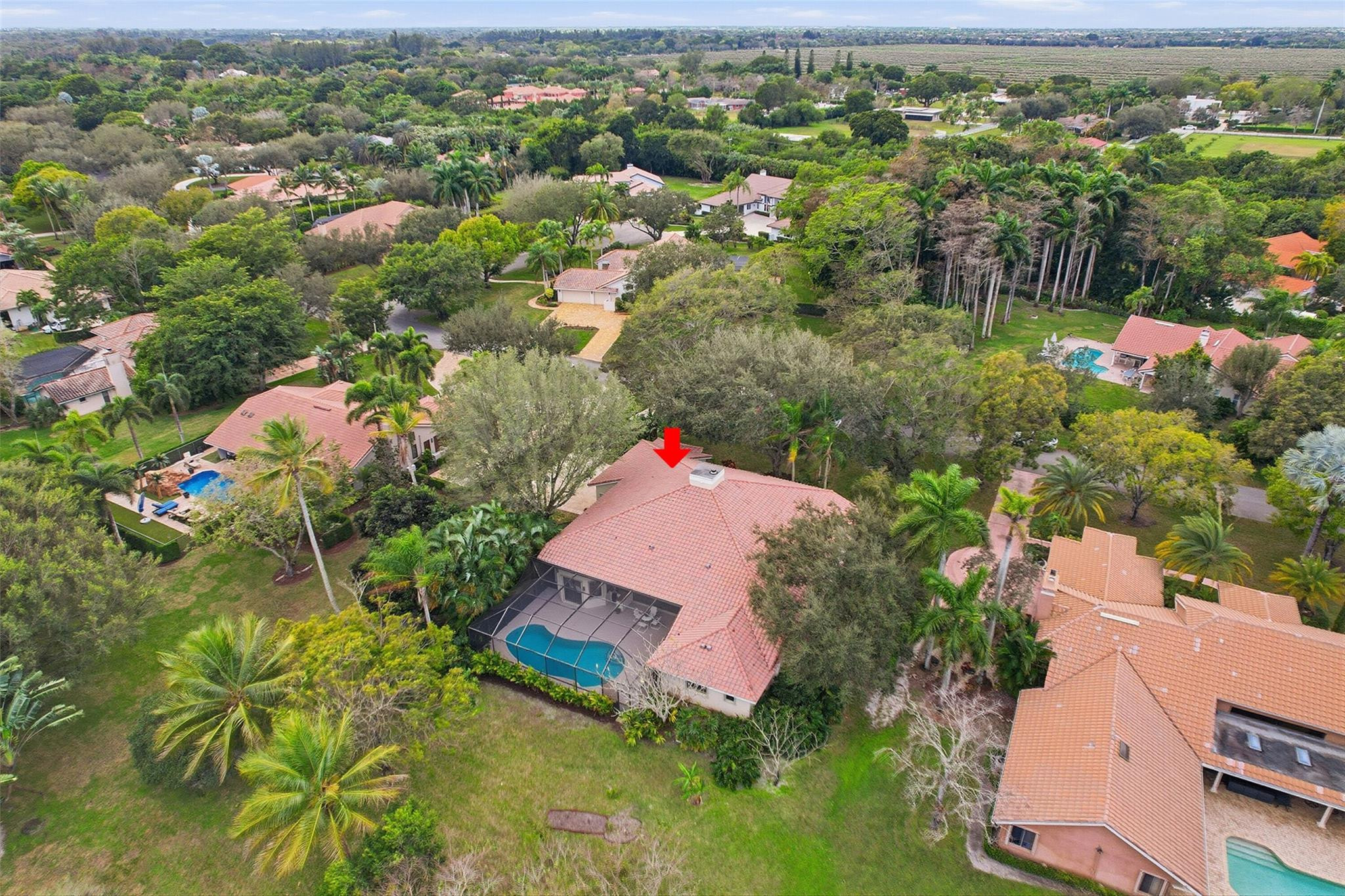 7720 West Upper Ridge Drive Parkland, FL 33067 - Photo 73 of 85 an aerial view of house with yard swimming pool and mountains