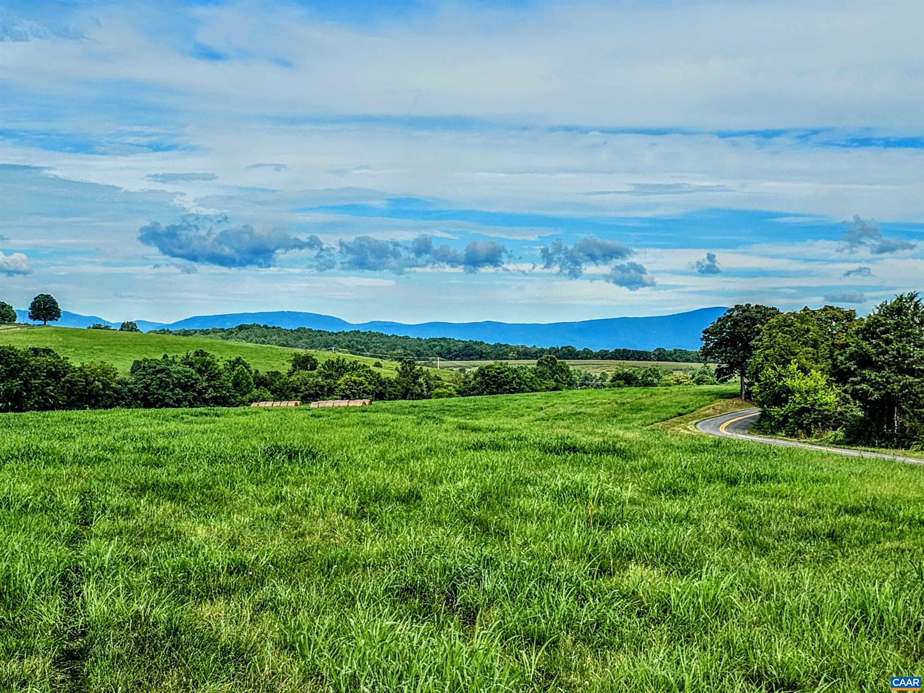 Lot 5 Fredericksburg Road Ruckersville, VA 22968 - Photo 5 of 6 a view of a field with an ocean