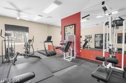 7701 West Robindale Road, Unit 277 Las Vegas, NV 89113 - Photo 30 of 33 A well-equipped exercise room offers diverse workout options for an active lifestyle.