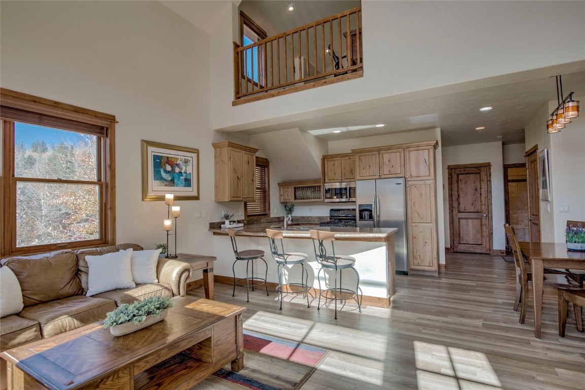 65 Antler Gulch Road, Unit 502 Keystone, CO 80435 - Photo 14 of 41 a living room with fireplace furniture and a window