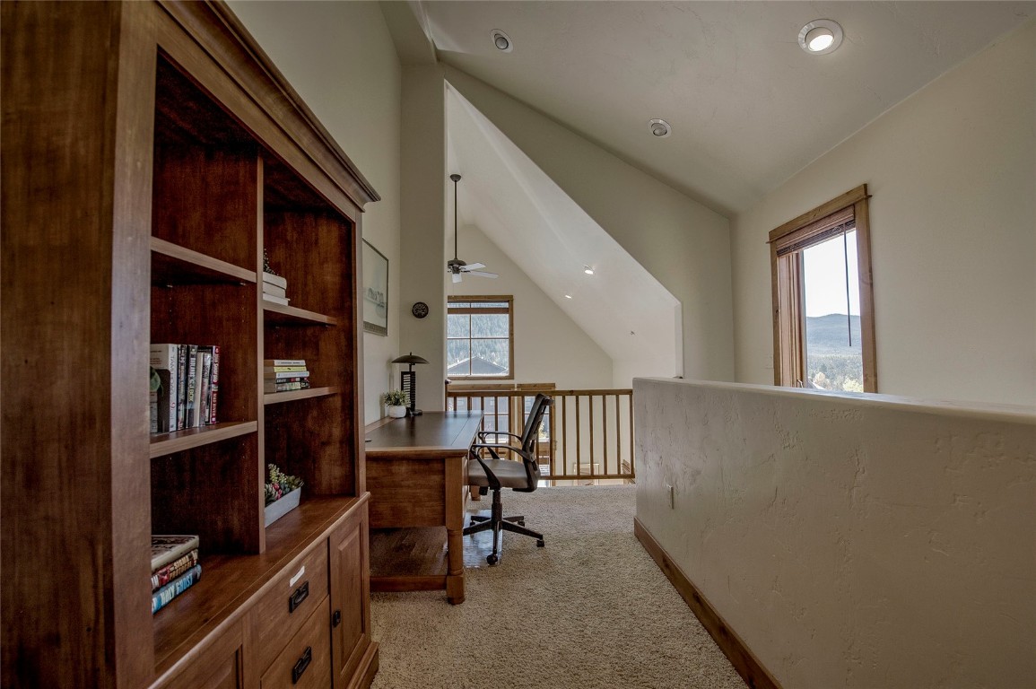 65 Antler Gulch Road, Unit 502 Keystone, CO 80435 - Photo 28 of 41 a view of a livingroom with furniture and staircase