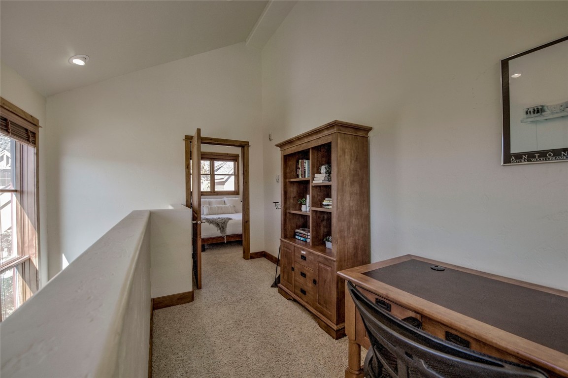 65 Antler Gulch Road, Unit 502 Keystone, CO 80435 - Photo 29 of 41 a room with furniture gym equipment and a window