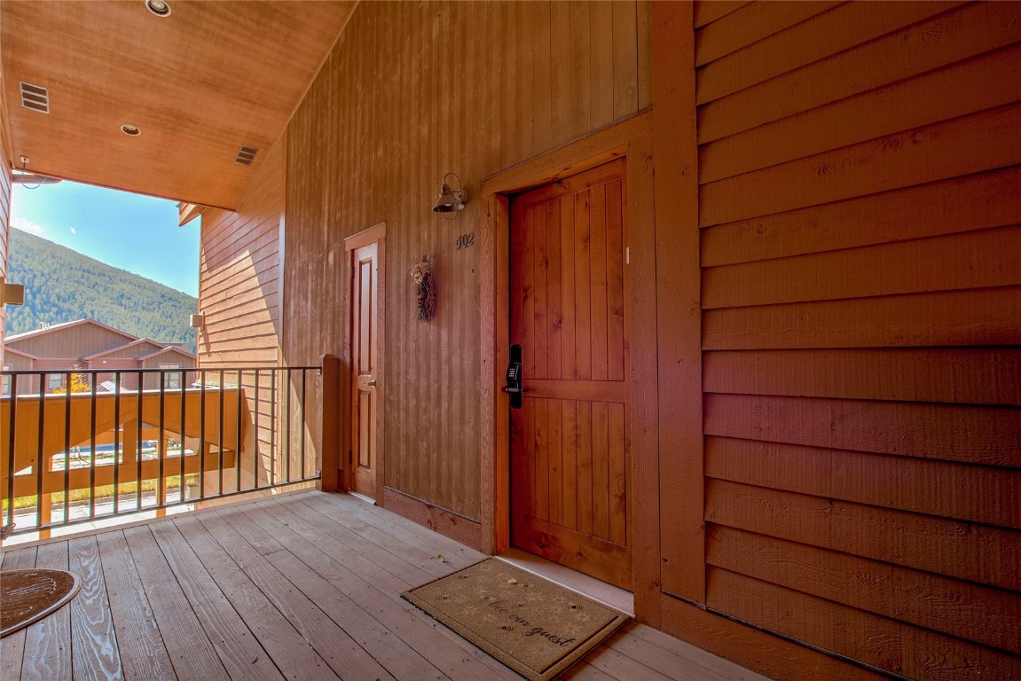 65 Antler Gulch Road, Unit 502 Keystone, CO 80435 - Photo 37 of 41 an empty room with wooden floor and windows