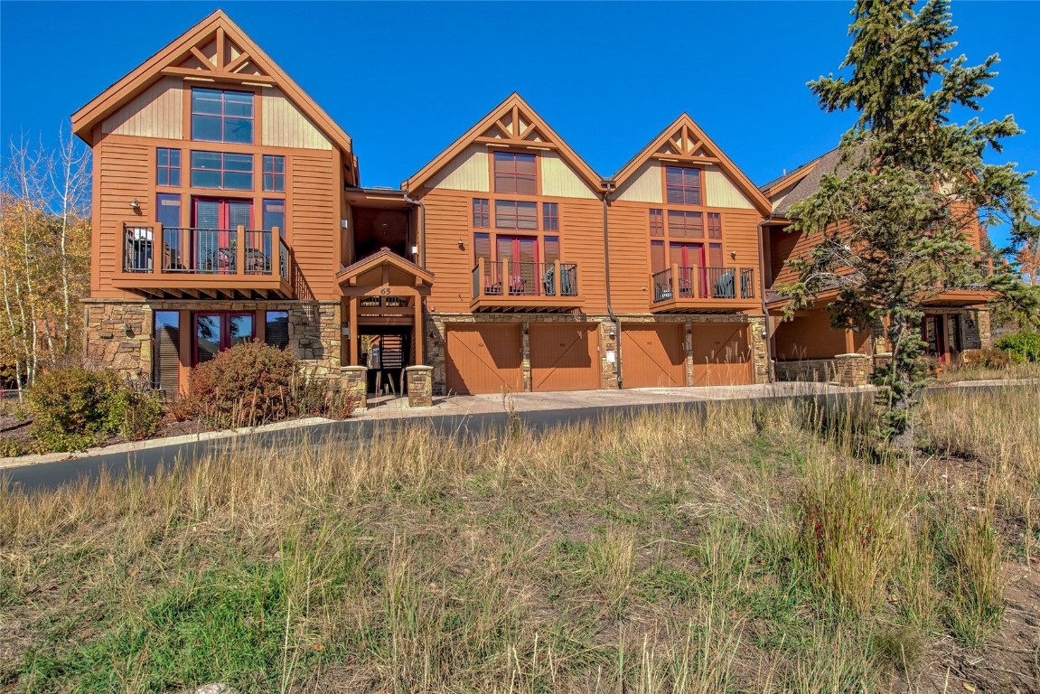 65 Antler Gulch Road, Unit 502 Keystone, CO 80435 - Photo 41 of 41 front view of a house with a yard