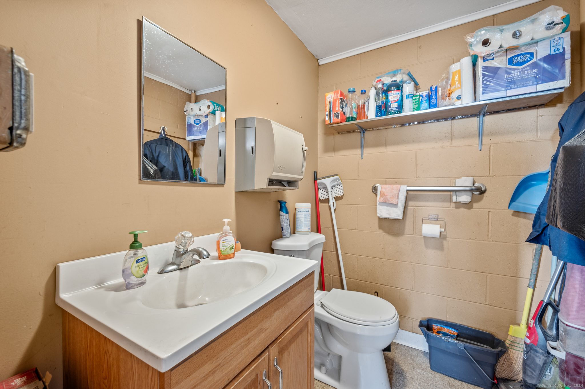 15 King Spring Road Windsor Locks, CT 06096 - Photo 24 of 27 a bathroom with a sink mirror and toilet